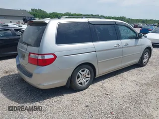 2007 Honda Odyssey EX-L z VIN 5FNRL38797B042602, wystawiony jako IAAI lot #42300656 z przebiegiem 250 000 mil mil oraz . Historia ofert i sprzedaży dostępna na DreamBid. Obrazek 4.