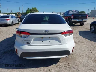 2022 Toyota Corolla LE with VIN JTDEPMAE8NJ209121, listed as a IAAI auction lot 39179770 with 41,893 mi miles and . Bid and sale history available at carsss.com. Image 16.