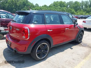2013 MINI Countryman S with VIN WMWZC3C58DWP24865, listed as a IAAI auction lot 42386463 with 100,612 mi miles and . Bid and sale history available at DreamBid. Image 4.