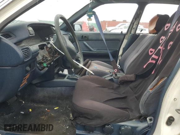 1991 Toyota Camry z VIN JT2SV21E2M3435406, wystawiony jako Copart lot #74958494 z przebiegiem 127 580 mil mil oraz Szkoda całkowita • Salvage title. Historia ofert i sprzedaży dostępna na DreamBid. Obrazek 7.