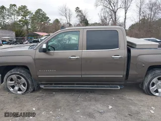 2015 Chevrolet Silverado 1500 LTZ with VIN 3GCUKSEC5FG467252, listed as a IAAI auction lot 41544477 with 144,719 mi miles. Bid and sale history available at carsss.com. Image 14.