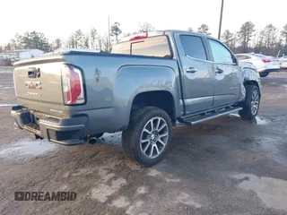 2021 GMC Canyon 4WD Denali with VIN 1GTG6EEN2M1123409, listed as a IAAI auction lot 41486932 with 1 mi miles. Bid and sale history available at carsss.com. Image 4.