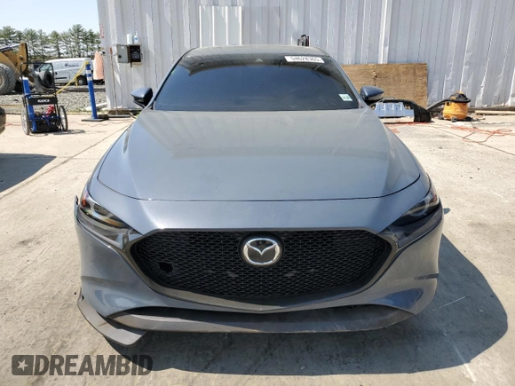 2021 Mazda 3 Premium with VIN JM1BPAML9M1307522, listed as a Copart auction lot 54628365 with 71,994 mi miles and Salvage title. Bid and sale history available at DreamBid. Image 5.