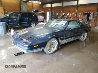 1987 Pontiac Firebird z VIN 1G2FS21S4HN213083, wystawiony jako Copart lot #69101254 z przebiegiem 172 214 mil mil oraz Szkoda całkowita • Salvage title. Historia ofert i sprzedaży dostępna na DreamBid. Obrazek 1.