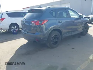 2013 Mazda CX-5 Touring with VIN JM3KE2CE6D0122405, listed as a IAAI auction lot 41743037 with 154,647 mi miles and . Bid and sale history available at carsss.com. Image 4.