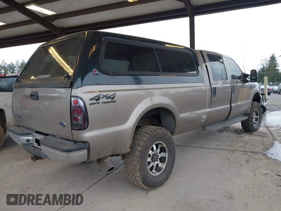 2002 Ford Super Duty F-250 XL with VIN 1FTNW21F92EB00672, listed as a IAAI auction lot 41699748 with 134,137 mi miles. Bid and sale history available at carsss.com. Image 4.