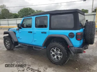 2021 Jeep Wrangler Unlimited Rubicon with VIN 1C4JJXFM4MW617635, listed as a Copart auction lot 58956205 with 52,995 mi miles and Salvage title. Bid and sale history available at DreamBid. Image 2.