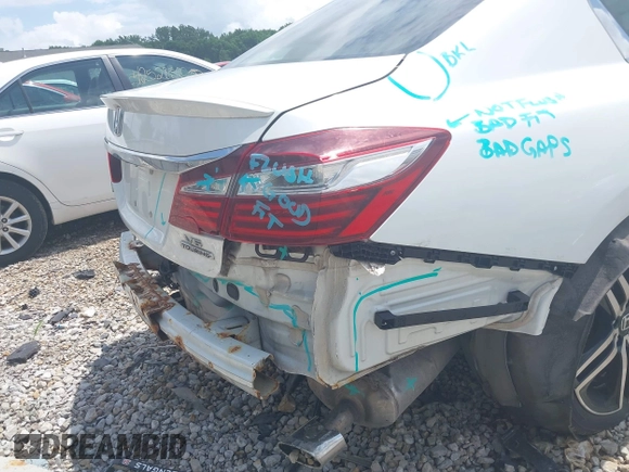 2017 Honda Accord Touring with VIN 1HGCR3F98HA003410, listed as a IAAI auction lot 42534659 with 211,470 mi miles and . Bid and sale history available at DreamBid. Image 18.
