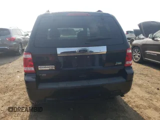 2010 Ford Escape Limited z VIN 1FMCU9EG7AKC73014, wystawiony jako Copart lot #59350805 z przebiegiem 53 032 mil mil oraz Szkoda całkowita • Salvage title. Historia ofert i sprzedaży dostępna na DreamBid. Obrazek 6.