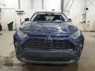 2021 Toyota RAV4 XLE with VIN 2T3P1RFV7MW196605, listed as a Copart auction lot 63502735 with 32,150 mi miles and Salvage title. Bid and sale history available at DreamBid. Image 5.
