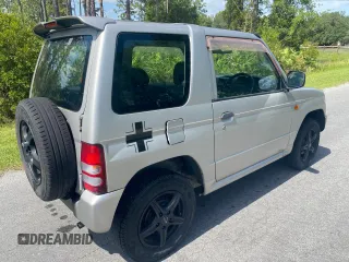 1997 Mitsubishi Montero z VIN H56A5204998, wystawiony jako Copart lot #60369925 z przebiegiem 108 584 mil mil oraz Czysty tytuł • Clean title. Historia ofert i sprzedaży dostępna na DreamBid. Obrazek 4.