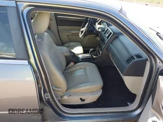 2007 Chrysler 300 Limited with VIN 2C3KA53G37H799150, listed as a IAAI auction lot 42104081 with 132,326 mi miles. Bid and sale history available at carsss.com. Image 5.