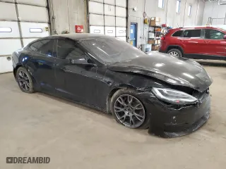 2021 Tesla Model S Plaid with VIN 5YJSA1E64MF454817, listed as a Copart auction lot 48243935 with 0 mi miles and Salvage Title. Bid and sale history available at carsss.com. Image 4.