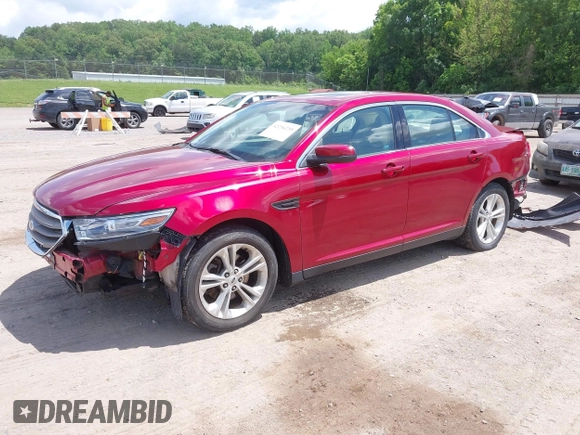 2014 Ford Taurus SEL z VIN 1FAHP2E89EG126922, wystawiony jako IAAI lot #42236235 z przebiegiem 176 917 mil mil oraz . Historia ofert i sprzedaży dostępna na DreamBid. Obrazek 2.