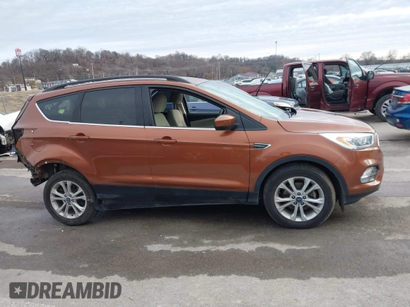 2017 Ford Escape SE with VIN 1FMCU0GD5HUE08097, listed as a IAAI auction lot 41499800 with 70,911 mi miles. Bid and sale history available at carsss.com. Image 13.