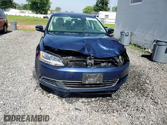 2014 Volkswagen Jetta SE z VIN 3VWD17AJ8EM413915, wystawiony jako Copart lot #62325025 z przebiegiem 131 112 mil mil oraz Szkoda całkowita • Salvage title. Historia ofert i sprzedaży dostępna na DreamBid. Obrazek 13.