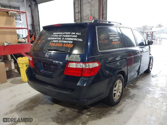 2007 Honda Odyssey EX-L with VIN 5FNRL38647B067415, listed as a IAAI auction lot 41690699 with 207,702 mi miles. Bid and sale history available at carsss.com. Image 4.