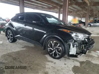 2018 Toyota C-HR XLE with VIN NMTKHMBX5JR056290, listed as a Copart auction lot 53560775 with 116,924 mi miles and Salvage title. Bid and sale history available at DreamBid. Image 4.