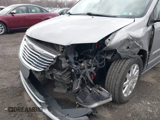 2014 Chrysler Town & Country Touring with VIN 2C4RC1BG1ER343069, listed as a IAAI auction lot 41683253 with 137,978 mi miles and . Bid and sale history available at DreamBid. Image 6.