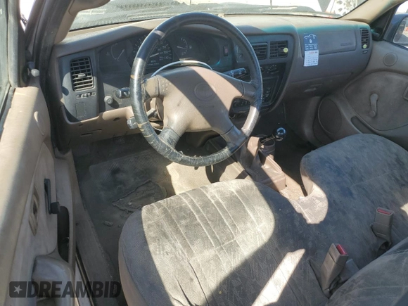 2003 Toyota Tacoma with VIN 5TENL42N03Z239856, listed as a Copart auction lot 51042335 with 460,407 mi miles and Salvage Title. Bid and sale history available at DreamBid. Image 8.