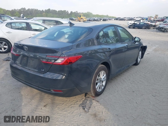 2025 Toyota Camry LE with VIN 4T1DAACKXSU541257, listed as a IAAI auction lot 42052246 with 13,585 mi miles and . Bid and sale history available at DreamBid. Image 4.