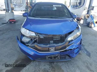 2015 Honda Fit EX-L with VIN 3HGGK5H8XFM776045, listed as a Copart auction lot 63940595 with 100,753 mi miles and Salvage title. Bid and sale history available at DreamBid. Image 5.