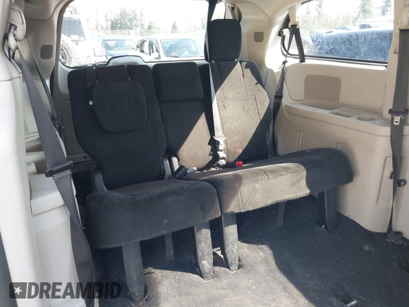 2012 Dodge Grand Caravan SXT with VIN 2C4RDGCG2CR319651, listed as a IAAI auction lot 42097594 with 155,521 mi miles and . Bid and sale history available at DreamBid. Image 8.