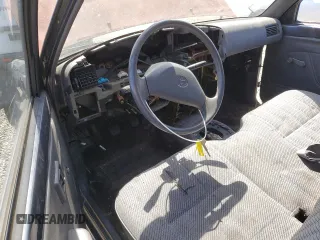 1993 Toyota Pickup z VIN 4TARN81A8PZ090398, wystawiony jako Copart lot #50452745 z przebiegiem Nie podano mil oraz Szkoda całkowita • Salvage title. Historia ofert i sprzedaży dostępna na DreamBid. Obrazek 8.