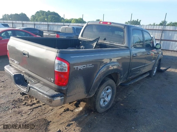 2005 Toyota Tundra SR5 with VIN 5TBET341X5S492020, listed as a IAAI auction lot 39732323 with 163,863 mi miles. Bid and sale history available at carsss.com. Image 4.
