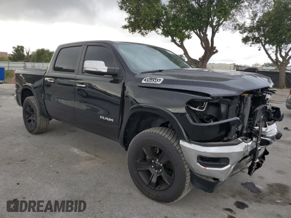 2022 Ram 1500 Laramie with VIN 1C6SRFJT4NN300006, listed as a Copart auction lot 54976775 with 61,436 mi miles and Salvage title. Bid and sale history available at DreamBid. Image 4.