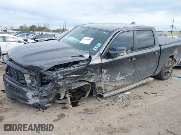 2021 Ram 1500 Lone Star with VIN 1C6RREFT2MN746770, listed as a IAAI auction lot 41360600 with 76,998 mi miles and . Bid and sale history available at DreamBid. Image 2.