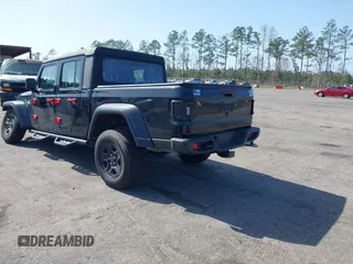 2022 Jeep Gladiator Texas Trail z VIN 1C6HJTAGXNL101704, wystawiony jako IAAI lot #41590378 z przebiegiem 29 299 mil mil oraz . Historia ofert i sprzedaży dostępna na DreamBid. Obrazek 3.
