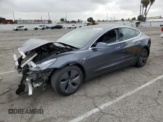 2020 Tesla Model 3 Standard Range Plus z VIN 5YJ3E1EA7LF743475, wystawiony jako Copart lot #56042075 z przebiegiem 87 620 mil mil oraz Szkoda całkowita • Salvage title. Historia ofert i sprzedaży dostępna na DreamBid. Obrazek 1.