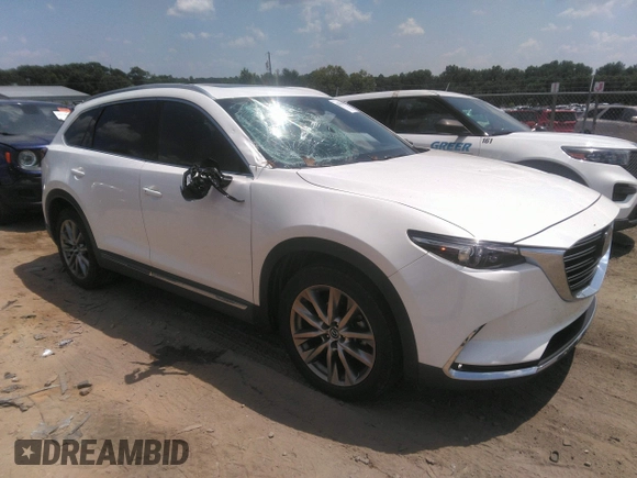 2017 Mazda CX-9 Signature with VIN JM3TCBEY2H0140598, listed as a IAAI auction lot 42561999 with 61,574 mi miles and . Bid and sale history available at DreamBid. Image 1.