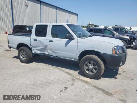 2003 Nissan Frontier XE with VIN 1N6ED27T23C456197, listed as a Copart auction lot 57393515 with 181,596 mi miles and Salvage title. Bid and sale history available at DreamBid. Image 4.