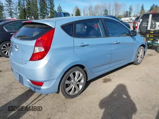 2014 Hyundai Accent SE with VIN KMHCU5AE0EU173862, listed as a IAAI auction lot 41872185 with 206,568 mi miles. Bid and sale history available at carsss.com. Image 4.