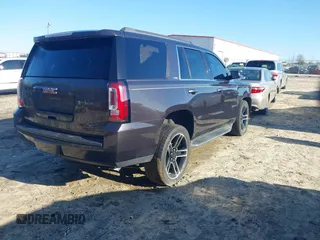 2017 GMC Yukon SLE with VIN 1GKS1AKC6HR343149, listed as a IAAI auction lot 41475728 with 102,508 mi miles. Bid and sale history available at carsss.com. Image 4.