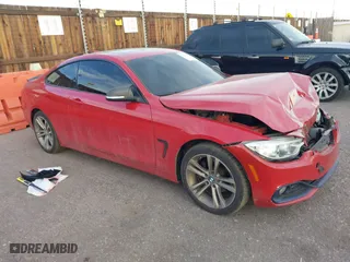 2014 BMW 4 Series 428i xDrive with VIN WBA3N5C58EK197382, listed as a IAAI auction lot 40925619 with 101,632 mi miles. Bid and sale history available at carsss.com. Image 1.