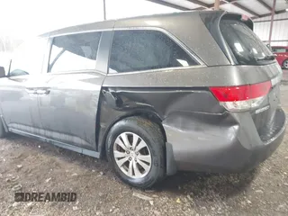 2014 Honda Odyssey EX-L with VIN 5FNRL5H6XEB060090, listed as a IAAI auction lot 41625571 with 112,762 mi miles and . Bid and sale history available at carsss.com. Image 6.