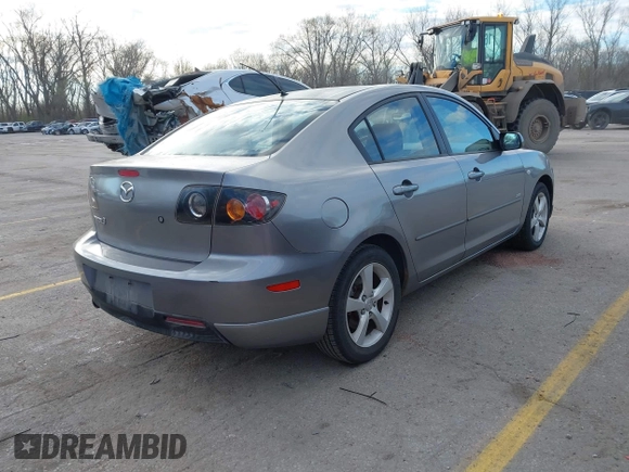 2005 Mazda 3 s with VIN JM1BK323551245843, listed as a IAAI auction lot 41860274 with 166,579 mi miles. Bid and sale history available at carsss.com. Image 4.