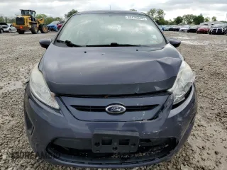 2013 Ford Fiesta S z VIN 3FADP4TJ6DM164936, wystawiony jako Copart lot #55470645 z przebiegiem 105 535 mil mil oraz Szkoda całkowita • Salvage title. Historia ofert i sprzedaży dostępna na DreamBid. Obrazek 5.