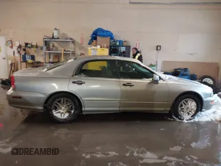 2002 Mitsubishi Diamante LS z VIN 6MMAP67P32T005867, wystawiony jako IAAI lot #41586460 z przebiegiem 390 586 mil mil oraz . Historia ofert i sprzedaży dostępna na DreamBid. Obrazek 13.