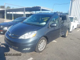2010 Toyota Sienna XLE with VIN 5TDYK4CC7AS337726, listed as a IAAI auction lot 41904653 with 174,564 mi miles. Bid and sale history available at carsss.com. Image 2.