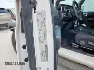 2023 Jeep Wrangler Sport with VIN 1C4HJXAG4PW667732, listed as a Copart auction lot 61261215 with 48,089 mi miles and Salvage title. Bid and sale history available at DreamBid. Image 12.