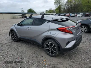 2019 Toyota C-HR XLE with VIN JTNKHMBX7K1048428, listed as a Copart auction lot 51943135 with 82,957 mi miles and Salvage Title. Bid and sale history available at carsss.com. Image 2.