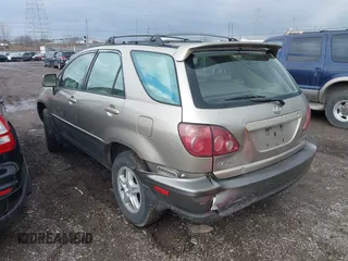 1999 Lexus RX 300 Luxury SUV with VIN JT6HF10U6X0054124, listed as a IAAI auction lot 41566201 with 220,462 mi miles. Bid and sale history available at carsss.com. Image 3.