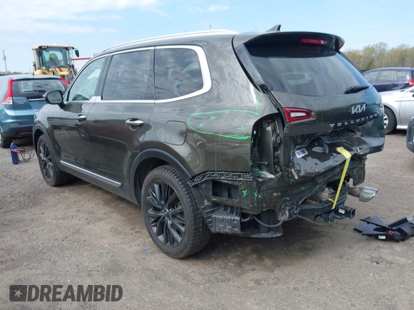2022 Kia Telluride SX with VIN 5XYP54HC4NG271392, listed as a IAAI auction lot 42019407 with 50,971 mi miles and . Bid and sale history available at DreamBid. Image 3.