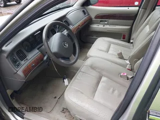 2010 Mercury Grand Marquis LS z VIN 2MEBM7FV5AX606629, wystawiony jako IAAI lot #42345444 z przebiegiem 66 600 mil mil oraz . Historia ofert i sprzedaży dostępna na DreamBid. Obrazek 5.