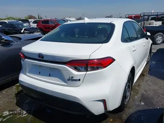 2023 Toyota Corolla Hybrid LE with VIN JTDBCMFE5P3026631, listed as a IAAI auction lot 41920841 with 105,932 mi miles. Bid and sale history available at carsss.com. Image 4.