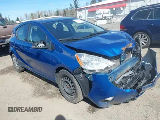 2014 Toyota Prius One with VIN JTDKDTB32E1574929, listed as a IAAI auction lot 39091611 with 128,131 mi miles and . Bid and sale history available at DreamBid. Image 1.
